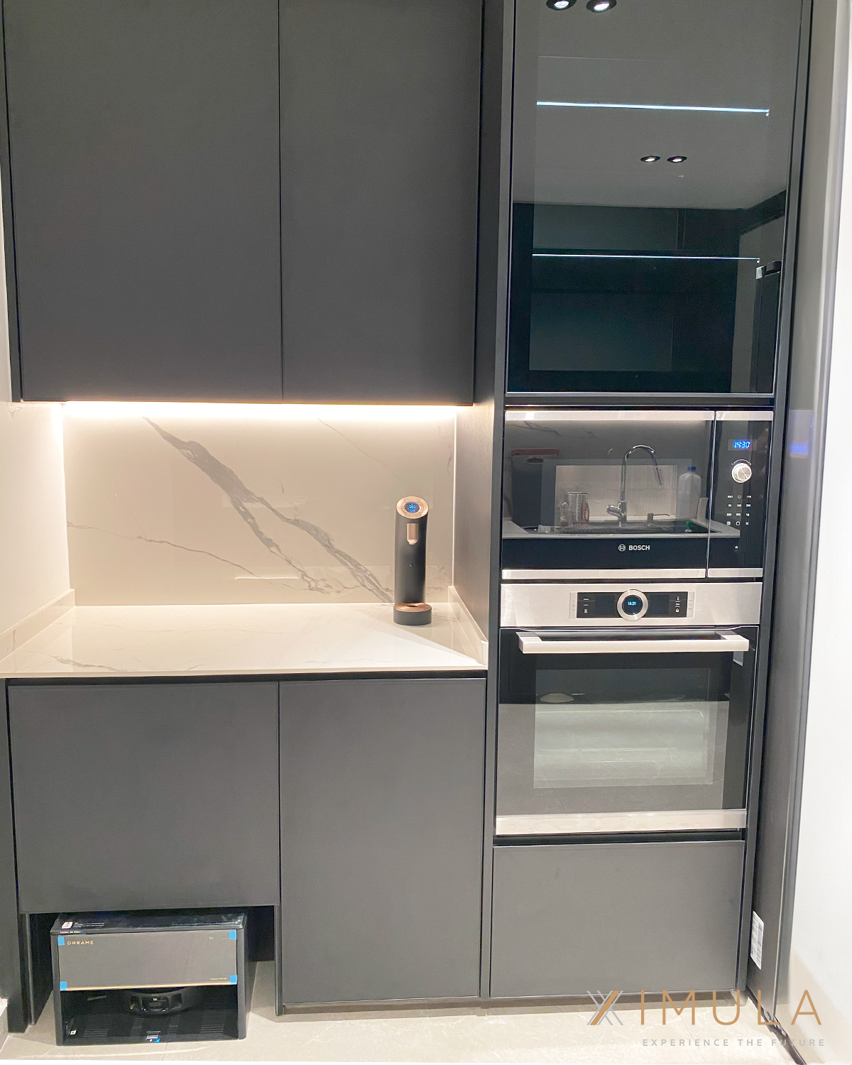 Ximula sleek matte black cabinets with integrated appliances
